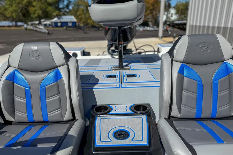 Slide: The Image of 2026 G3 Sportsman 1810 SE boat seats with blue and gray design, featuring cup holders. - 8