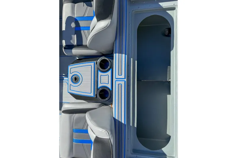 Slide: The Image of 2026 G3 Sportsman 1810 SE boat interior with gray and blue seating and storage compartment. - 9