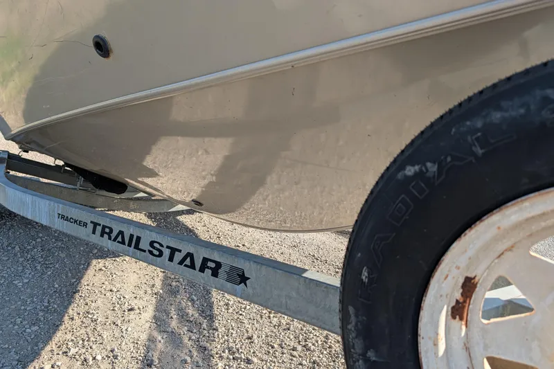 Slide: The Image of 2003 Tracker Targa 17 SC boat on a Trailstar trailer, close-up view. - 12