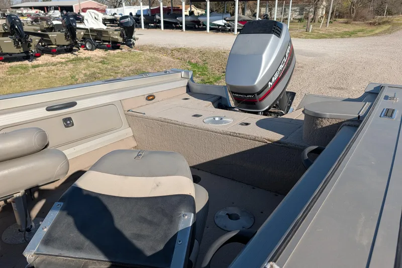 Slide: The Image of 2003 Tracker Targa 17 SC boat interior with Mercury outboard motor. - 15