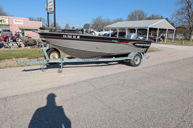 The Image of 2003 Tracker Targa 17 SC boat on a trailer in a parking lot. - 3