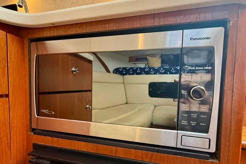 Slide: The Image of Panasonic microwave in 2007 Tiara Yachts 3000 Open, reflecting cabin interior. - 20