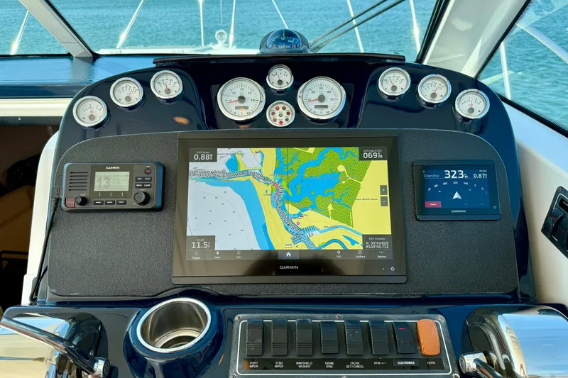 Slide: The Image of Dashboard of a 2007 Tiara Yachts 3000 Open with navigation instruments. - 30