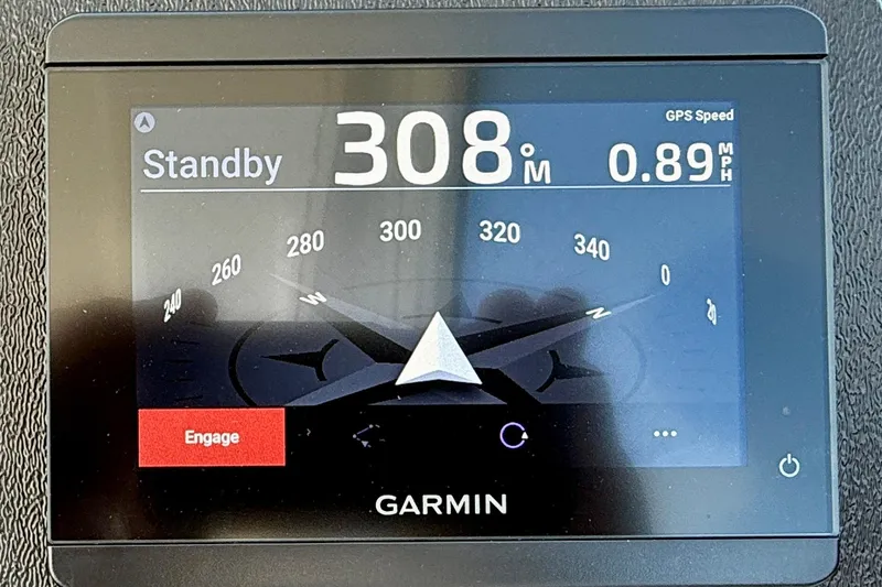 Slide: The Image of Garmin navigation display on 2007 Tiara Yachts 3000 Open, showing heading and speed. - 32