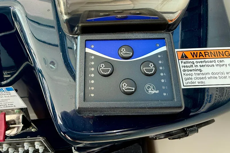 Slide: The Image of Control panel on a 2007 Tiara Yachts 3000 Open with warning label. - 34