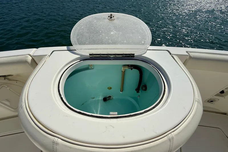 Slide: The Image of Livewell on a 2007 Tiara Yachts 3000 Open, open lid, ocean background. - 40