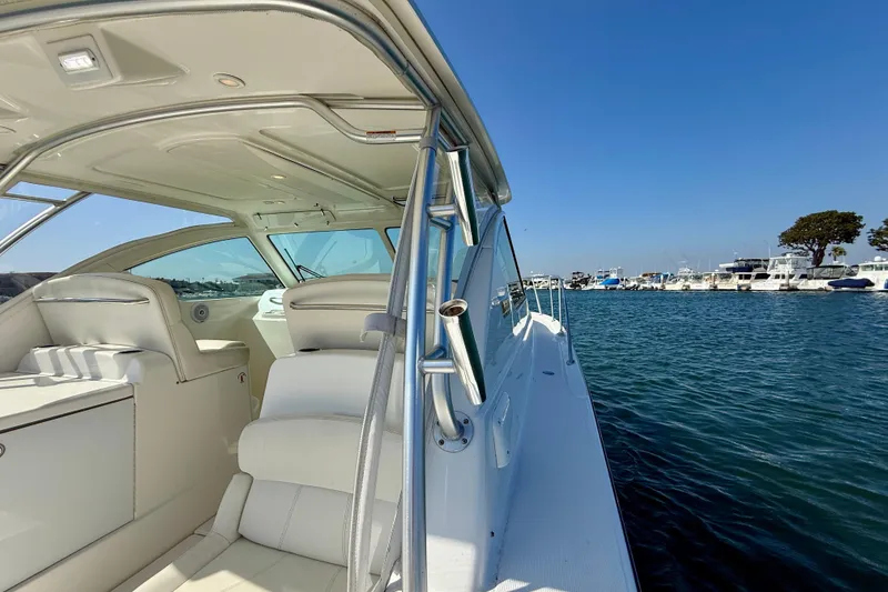 Slide: The Image of 2007 Tiara Yachts 3000 Open on calm water, showcasing luxurious interior and sleek design. - 43