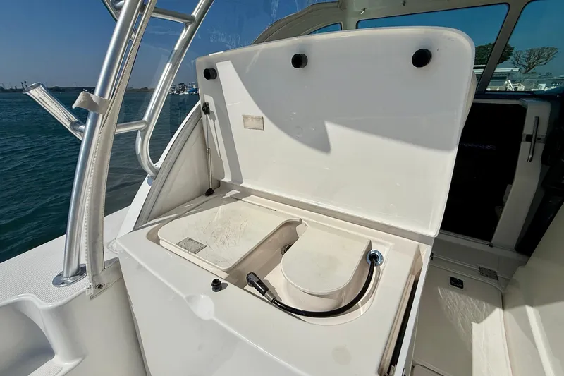 Slide: The Image of 2007 Tiara Yachts 3000 Open boat interior with open storage compartment. - 47