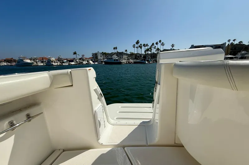 Slide: The Image of 2007 Tiara Yachts 3000 Open, view from deck, marina backdrop, clear sky. - 50