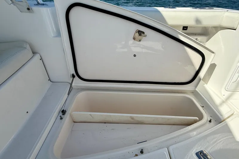Slide: The Image of Open storage compartment on a 2007 Tiara Yachts 3000 Open boat. - 57