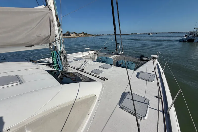 Slide: The Image of 2009 Nautitech 47 catamaran deck view on calm waters. - 20