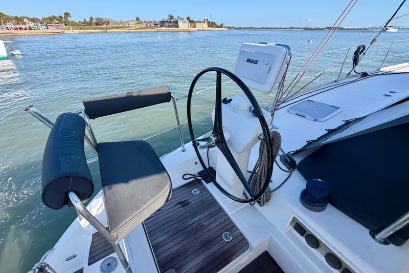 Slide: The Image of Cockpit of 2009 Nautitech 47 catamaran with steering wheel and navigation equipment. - 28