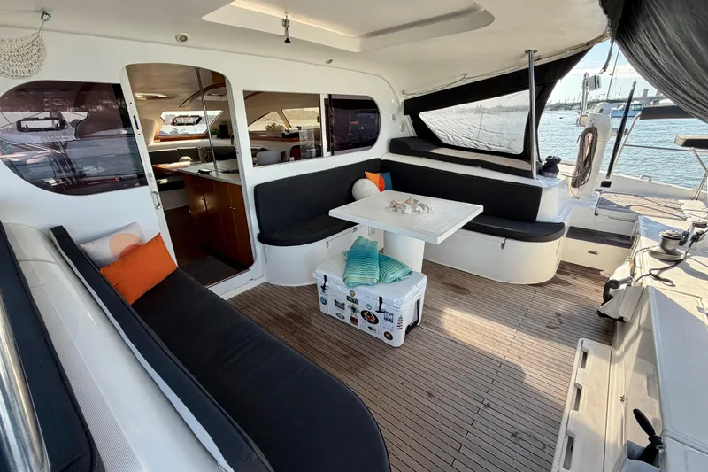 Slide: The Image of Spacious 2009 Nautitech 47 yacht interior with seating, table, and ocean view. - 39