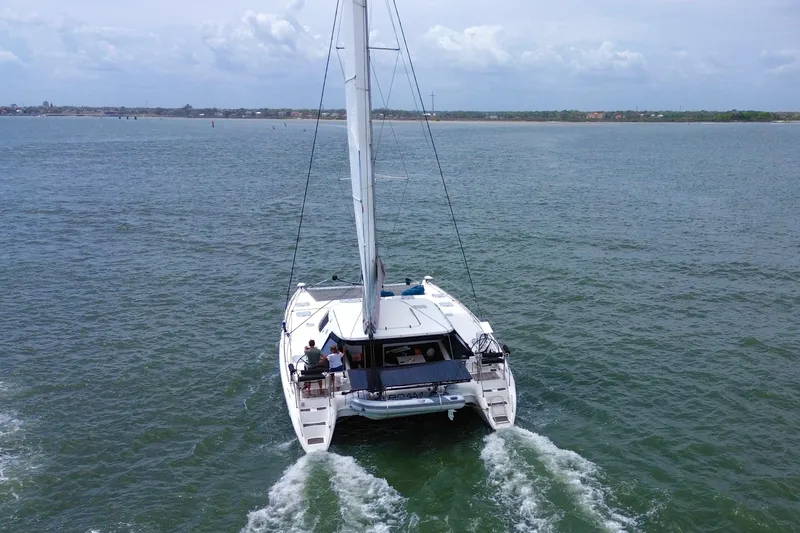 Slide: The Image of Nautitech 47 catamaran sailing on open water, 2009 model. - 8