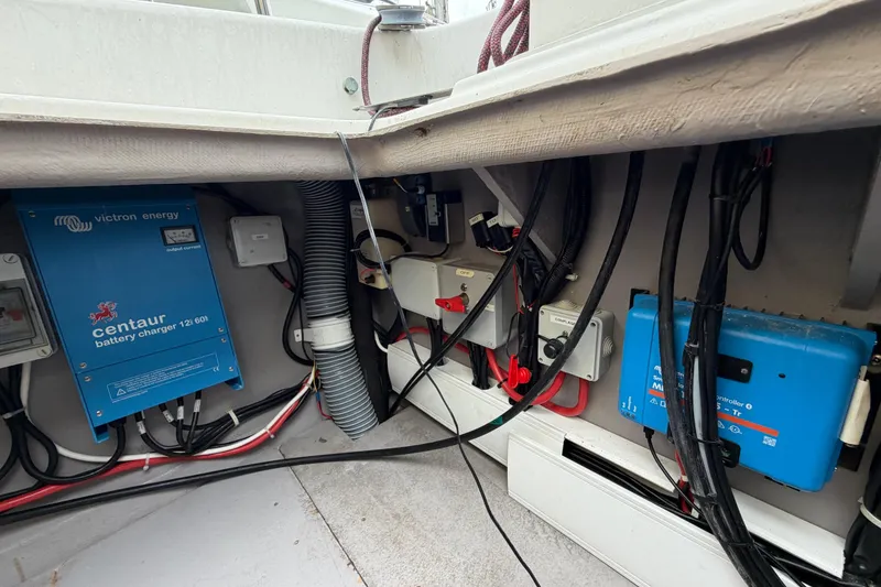 Slide: The Image of Electrical system inside a 2009 Nautitech 47, featuring Victron Energy components. - 83
