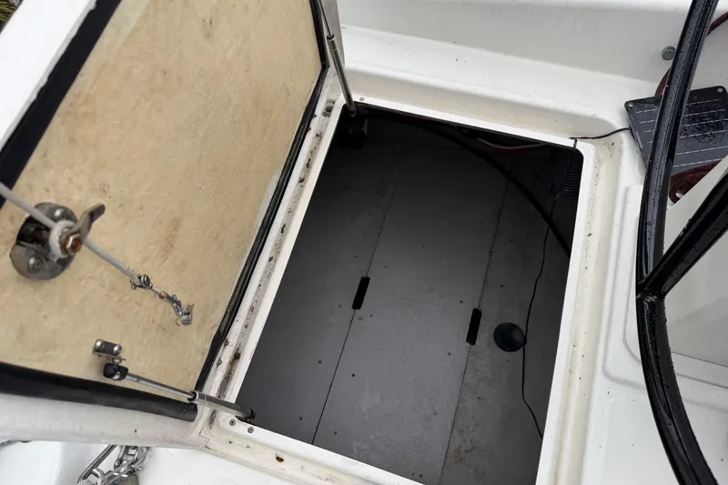Slide: The Image of Open hatch on a 2009 Nautitech 47 catamaran, revealing storage compartment. - 88