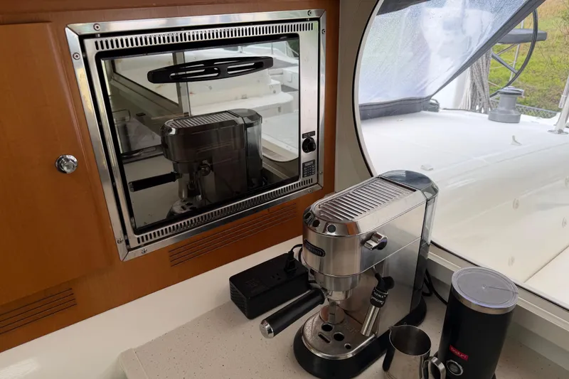 Slide: The Image of Coffee machine setup on Nautitech 47 yacht, 2009 model, with window view. - 94