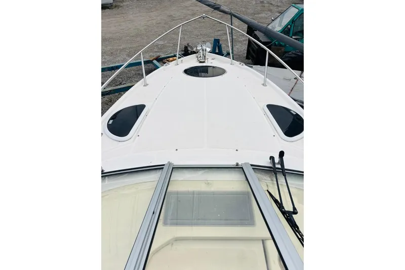 Slide: The Image of 2019 Regal 28 Express boat deck with sleek design and modern features. - 14