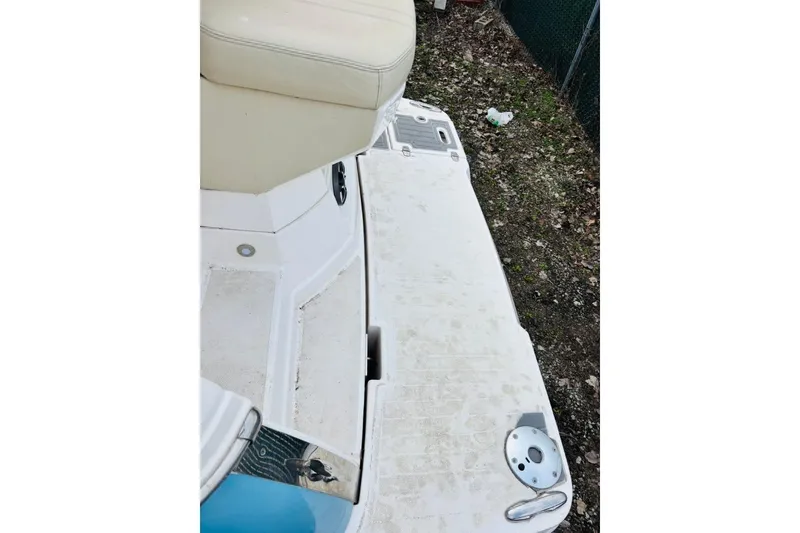Slide: The Image of 2019 Regal 28 Express boat deck with seating and swim platform. - 4