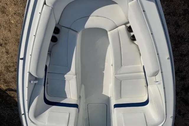 Slide: The Image of 2007 Formula 280 Bowrider boat interior with white seating and blue accents. - 10
