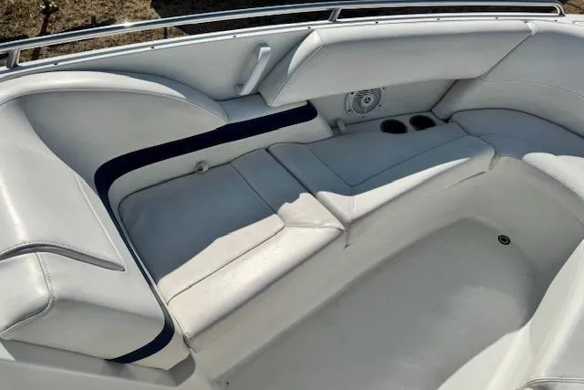 Slide: The Image of 2007 Formula 280 Bowrider interior with white seating and cup holders. - 11
