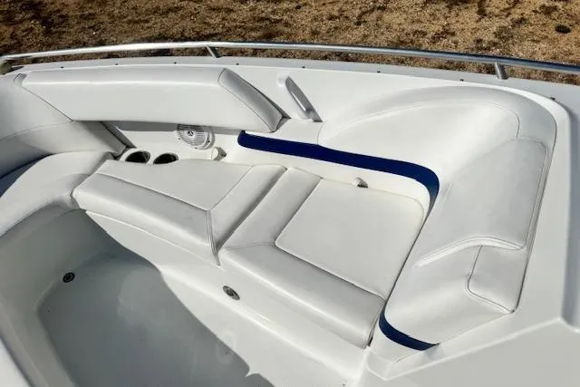 Slide: The Image of 2007 Formula 280 Bowrider boat interior with white seating and blue accents. - 12