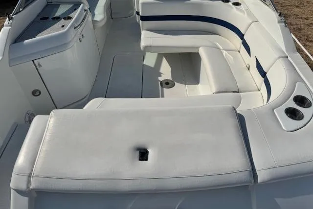 Slide: The Image of 2007 Formula 280 Bowrider interior with white seating and blue accents. - 13