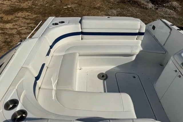 Slide: The Image of 2007 Formula 280 Bowrider boat interior with white and blue seating arrangement. - 14