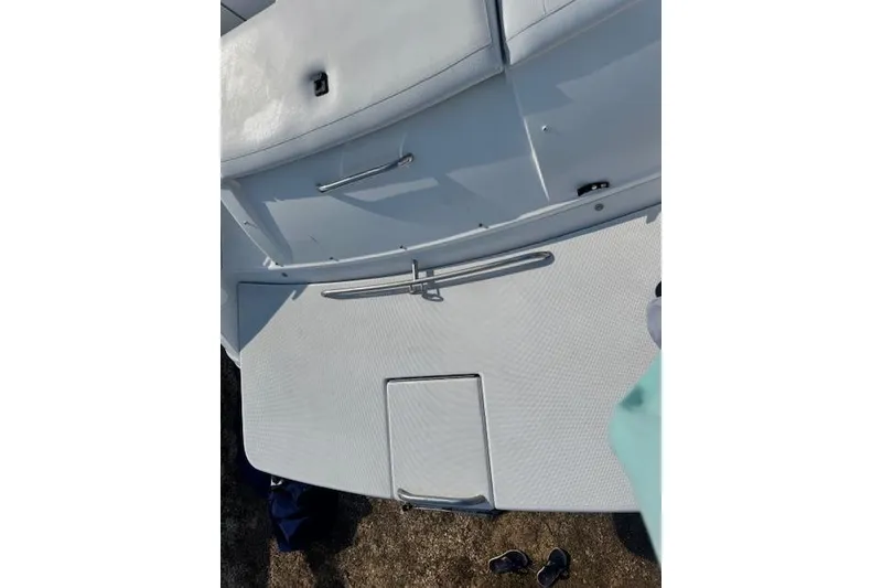 Slide: The Image of 2007 Formula 280 Bowrider boat deck with white seating and swim platform. - 15