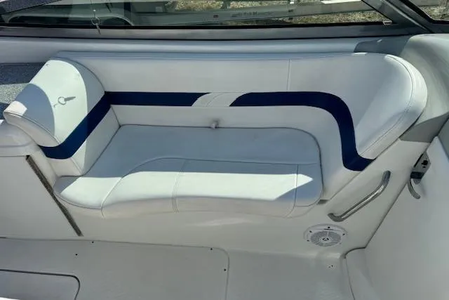 Slide: The Image of 2007 Formula 280 Bowrider interior seating with white and blue upholstery. - 18