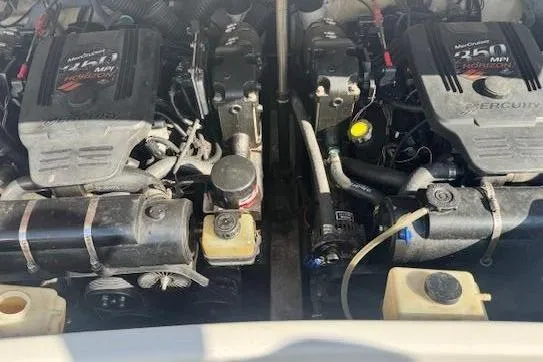 Slide: The Image of Engine compartment of a 2007 Formula 280 Bowrider boat with twin Mercury engines. - 24