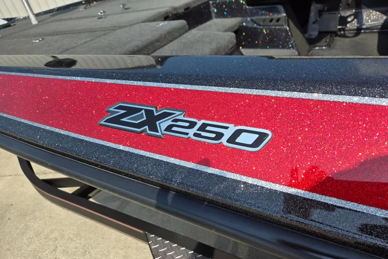 Slide: The Image of 2019 Skeeter ZX250 boat with glittery red and black detailing. - 11