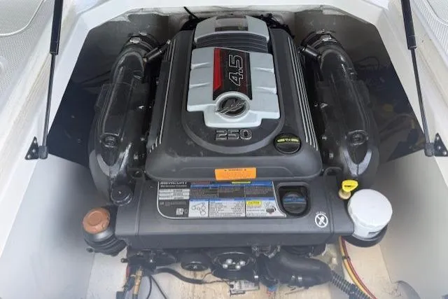 Slide: The Image of 2023 Chaparral 21 SSi boat engine, featuring a 4.5L 250 horsepower motor. - 24