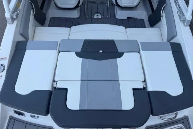 Slide: The Image of 2023 Chaparral 21 SSi boat interior with sleek, modern seating design. - 25