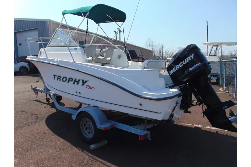 Slide: The Image of 2009 Trophy 1902 Walkaround boat with Mercury engine on trailer. - 7