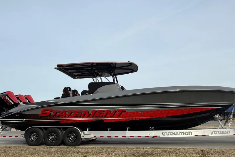 The Image of 2026 Statement 350 Open boat on trailer, featuring sleek design and powerful engines. - 0