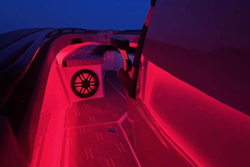 Slide: The Image of Interior of 2026 Statement 350 Open boat with vibrant red LED lighting. - 14