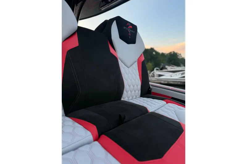 Slide: The Image of Luxurious seating in 2026 Statement 350 Open boat, featuring red, black, and white upholstery. - 5