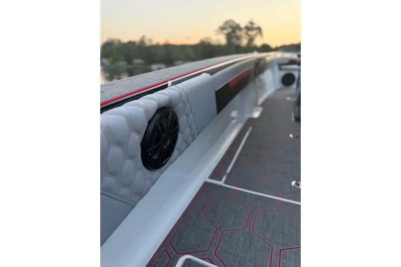 Slide: The Image of 2026 Statement 350 Open boat interior with hexagonal pattern and speaker detail. - 7