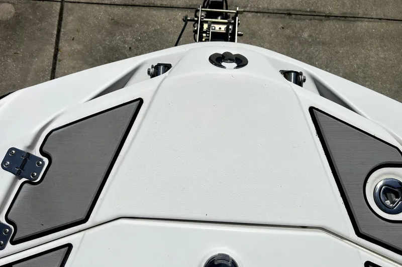 Slide: The Image of Bow of 2020 Scarab 255 ID boat with sleek design and hardware details. - 11
