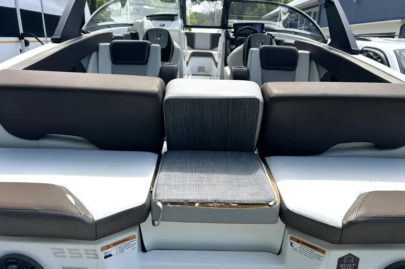 Slide: The Image of 2020 Scarab 255 ID boat interior with seating and dashboard view. - 16