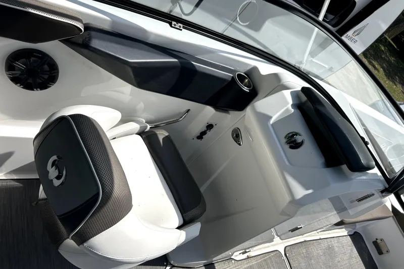 Slide: The Image of 2020 Scarab 255 ID boat interior with seating and dashboard details. - 18