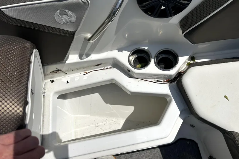 Slide: The Image of Interior of 2020 Scarab 255 ID boat showing seating and cup holders. - 27