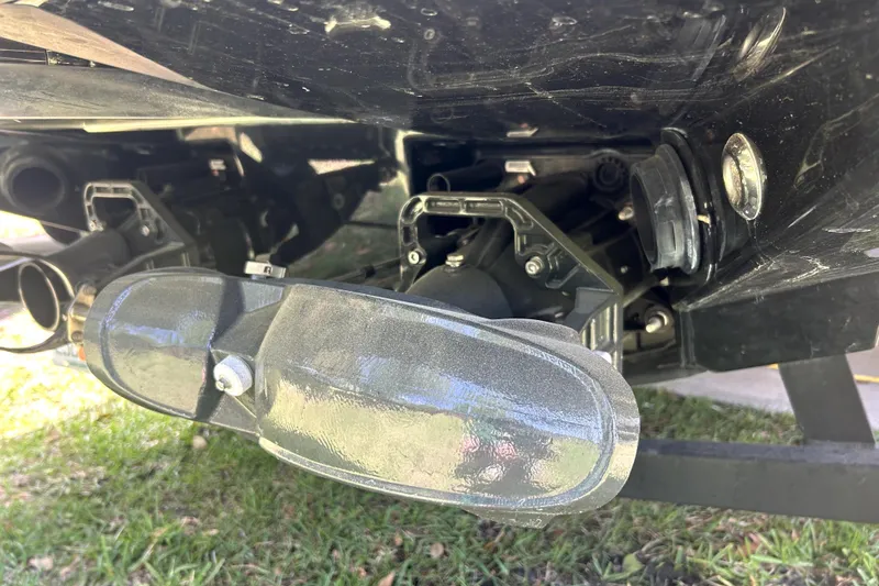 Slide: The Image of Close-up of 2020 Scarab 255 ID boat's jet propulsion system on grass. - 35