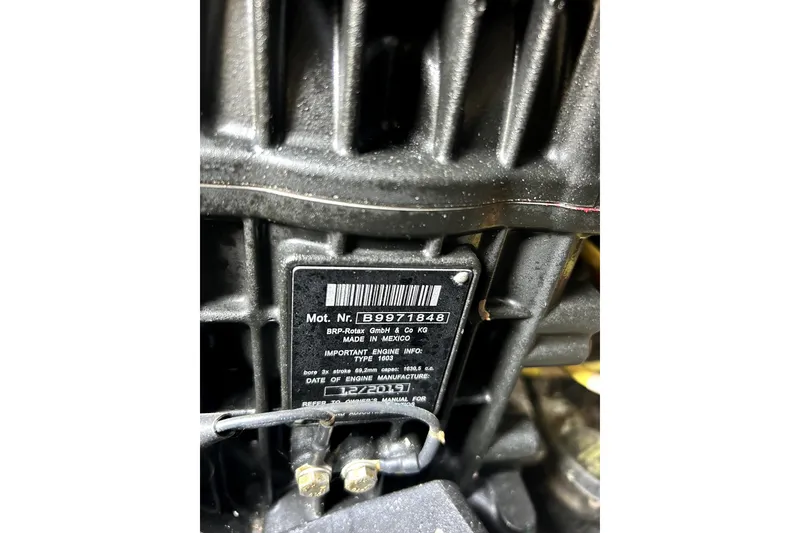 Slide: The Image of Close-up of a Scarab 255 ID 2020 engine label with serial number. - 38