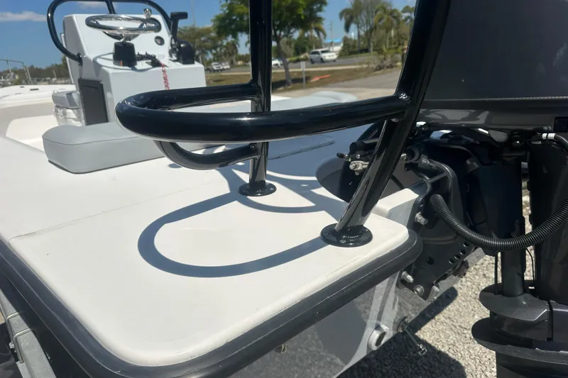 Slide: The Image of 2026 Delta Boatworks Delta D18, close-up of helm and seating area. - 11