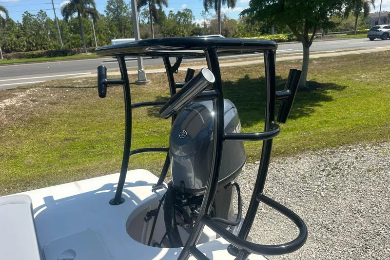 Slide: The Image of 2026 Delta Boatworks Delta D18 with Yamaha outboard motor, parked outdoors. - 14