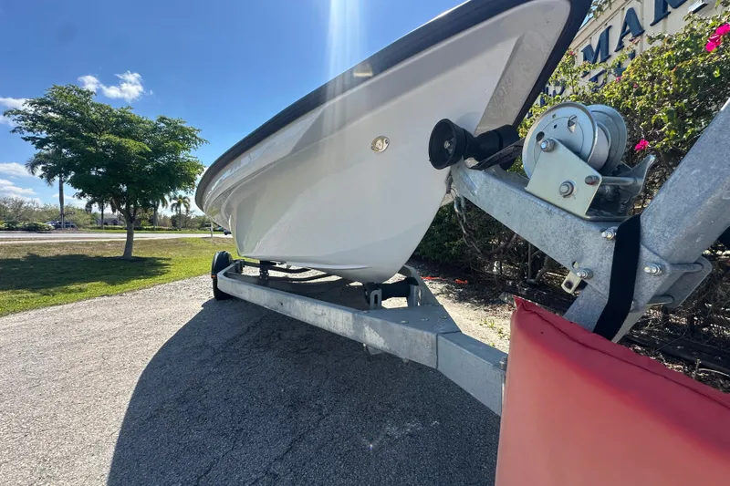 Slide: The Image of 2026 Delta Boatworks Delta D18 on trailer under clear blue sky. - 2