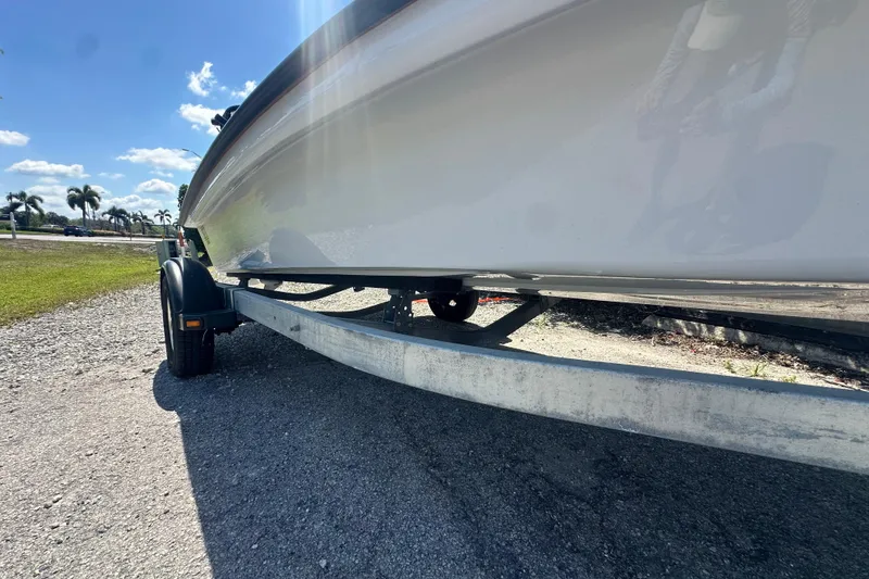 Slide: The Image of 2026 Delta Boatworks Delta D18 on trailer under sunny sky. - 4