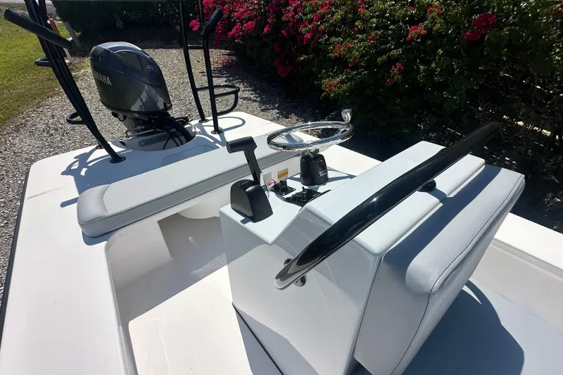 Slide: The Image of 2026 Delta Boatworks Delta D18 interior with Yamaha engine, sleek design, and modern controls. - 6